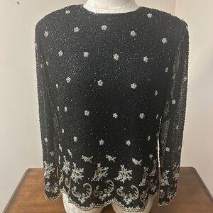 Silk beaded and embroirdered long sleeve black tunic..